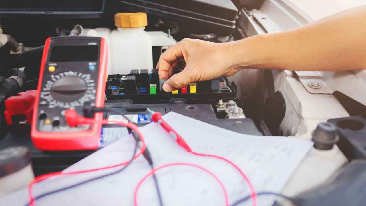 checking car with multimeter