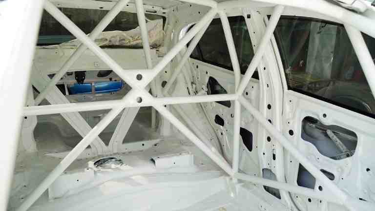 racing car's roll cage almost complete